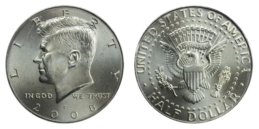 Side-by-side comparison of a typical 2008 Kennedy half dollar in MS63 versus a gem MS67+ example with blazing luster