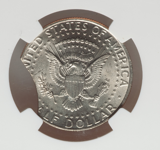 2008 Kennedy half dollar clipped planchet error showing crescent-shaped missing edge section