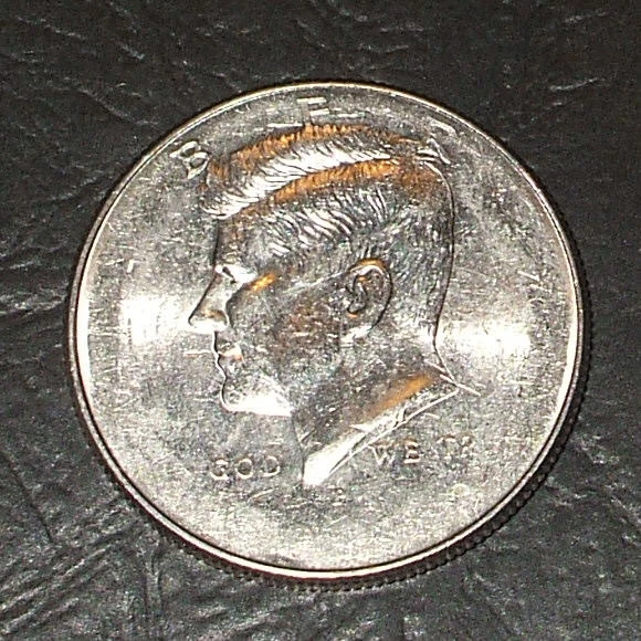 2008 Kennedy half dollar struck-through grease error showing soft mushy design details on the reverse eagle