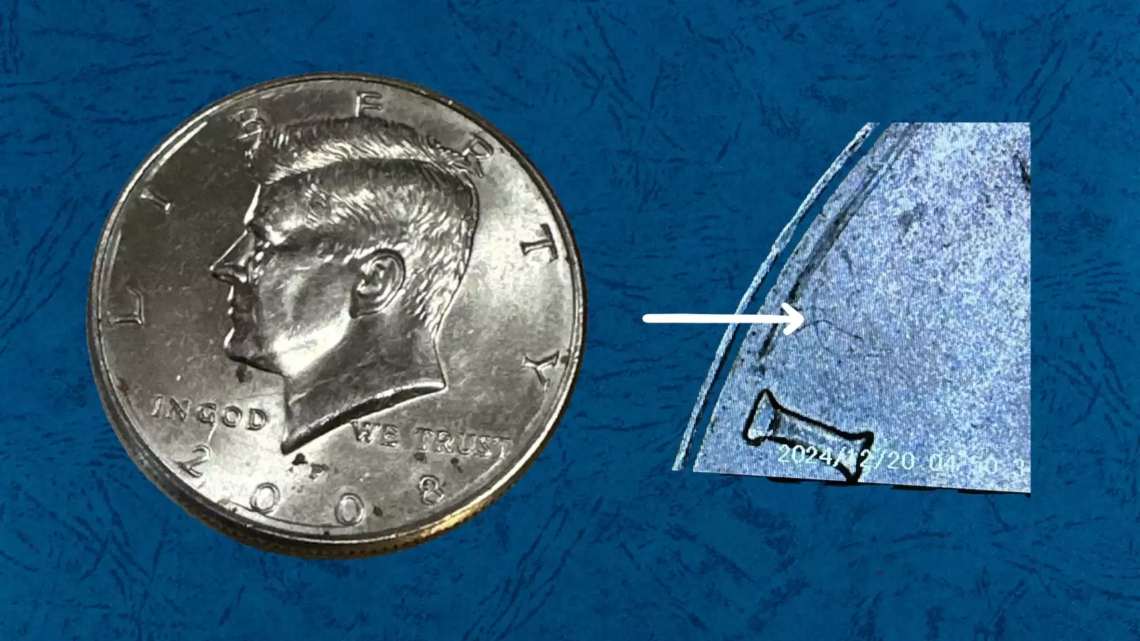 2008 Kennedy half dollar die crack error showing raised irregular line across the obverse field